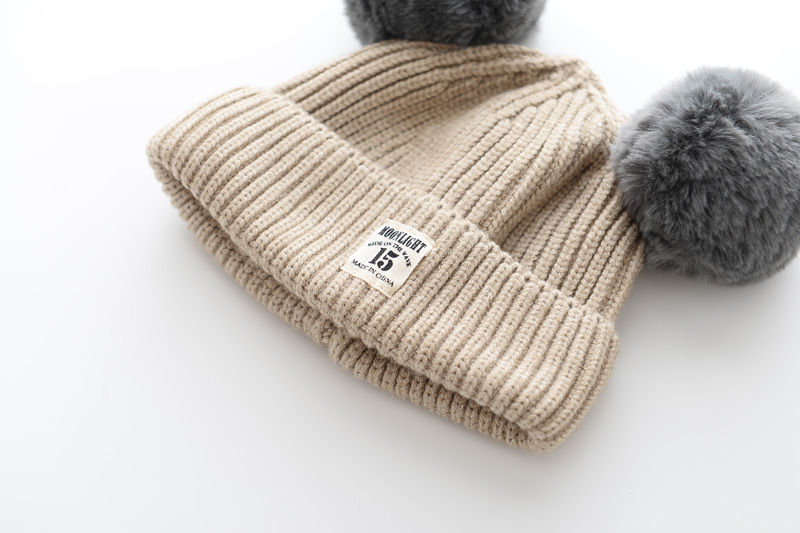 Baby wool cap on a child